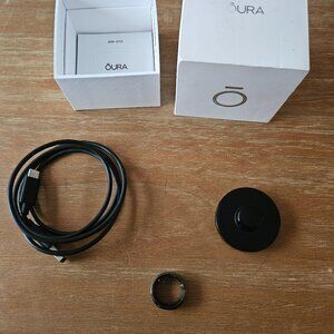 Gen 2 Oura ring with charging base and cord